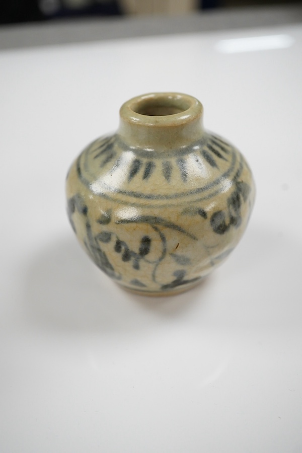 A Chinese blue and white jarlet and a tang dynasty glazed jarlet, 9cm. Condition - commensurate with age